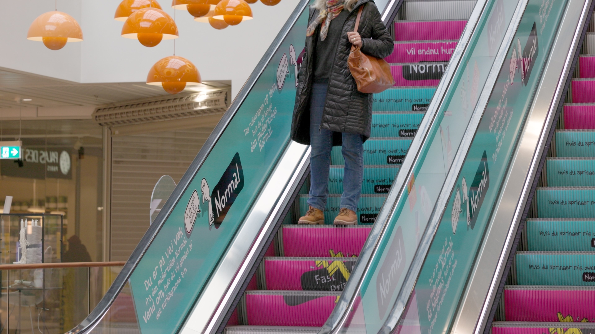 Normal Esclator Branding